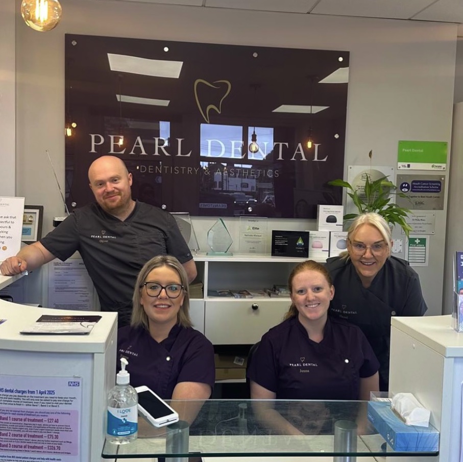 The reception team at the Pearl Dental front desk